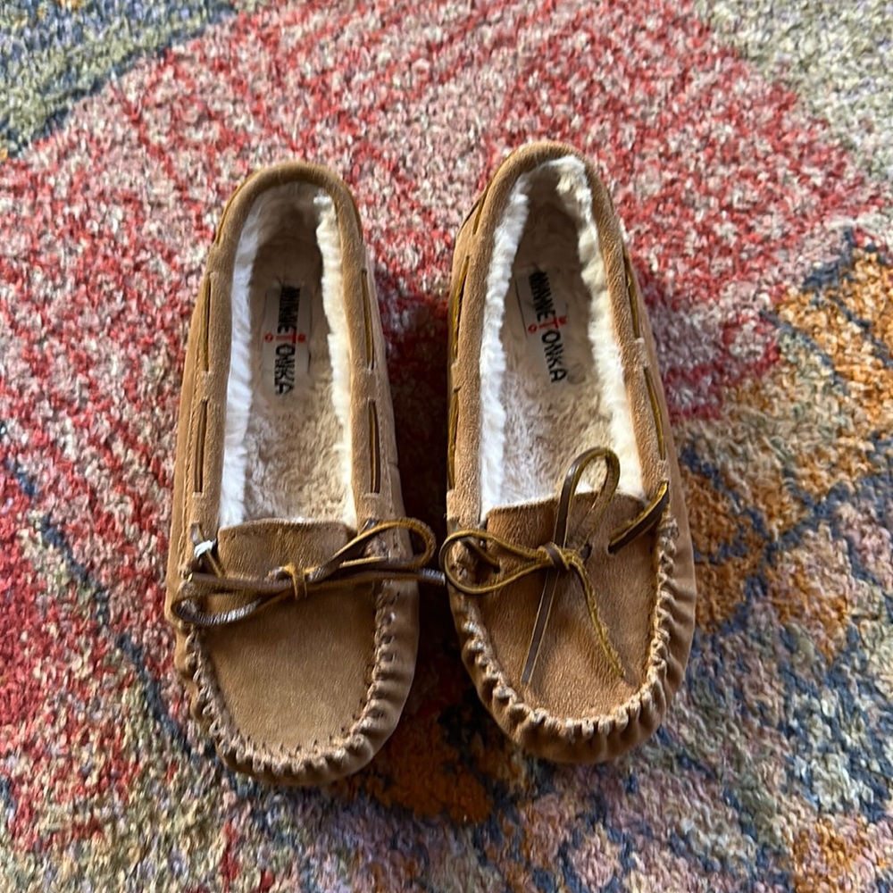 Minnetonka moccasins, fur lined (faux). Size 6. Brand new.